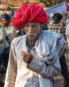 Old man in market place in India